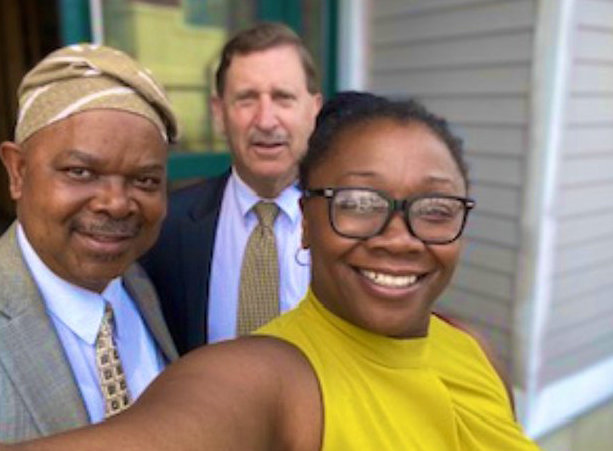 Neil Steinberg, center, president and CEO of the Rhode Island Foundation, with Muraina “Morris” Akinfolarin, left, and Angela Ankoma, executive vice president at the Rhode Island Foundation, right, on a recent visit to the Oasis International center.
